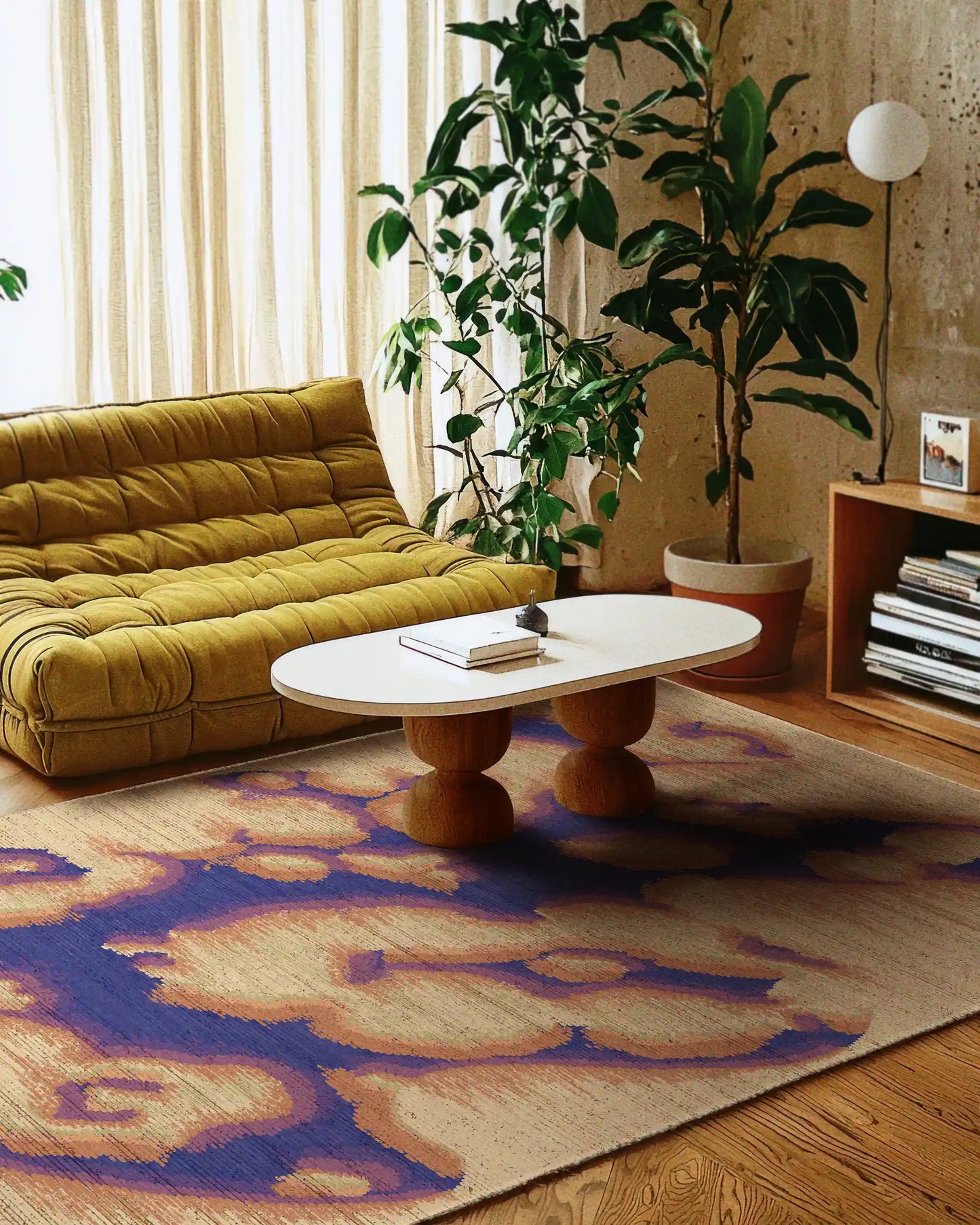 A dopamine abstract camouflage area rug measuring 5x7 ft, featuring purplish blue and creamy yellow hues, emphasizing its bold and stylish design placed on a wooden floor beside a coffee table, large houseplant, and yellow sofa. Perfect for adding a playful, eclectic touch to home decor in a Memphis eclectic apartment.