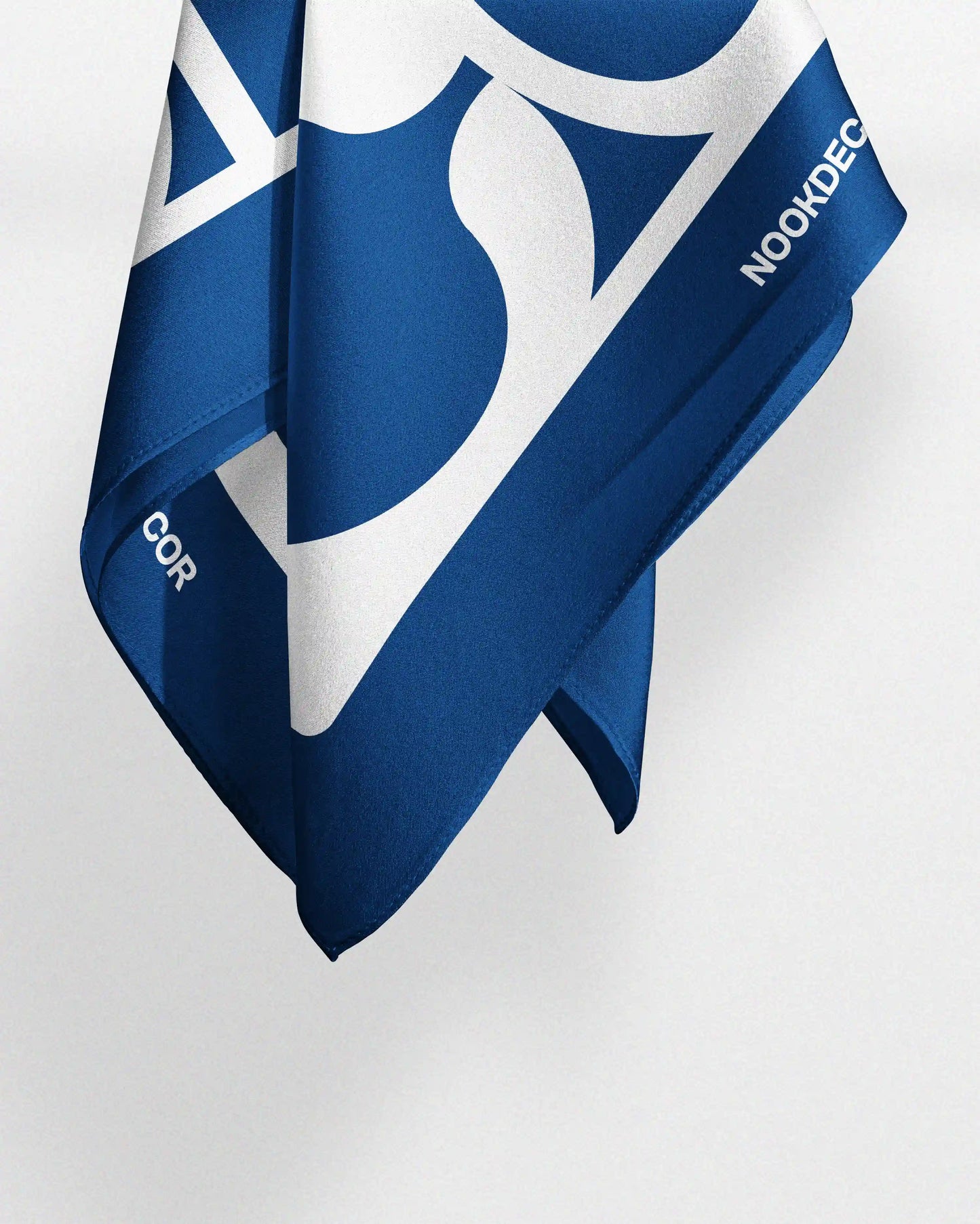 Blue and white silk scarf with geometric design inspired by NOOKDECOR's logo. Dopamine style accessories for Y2K trend setter.