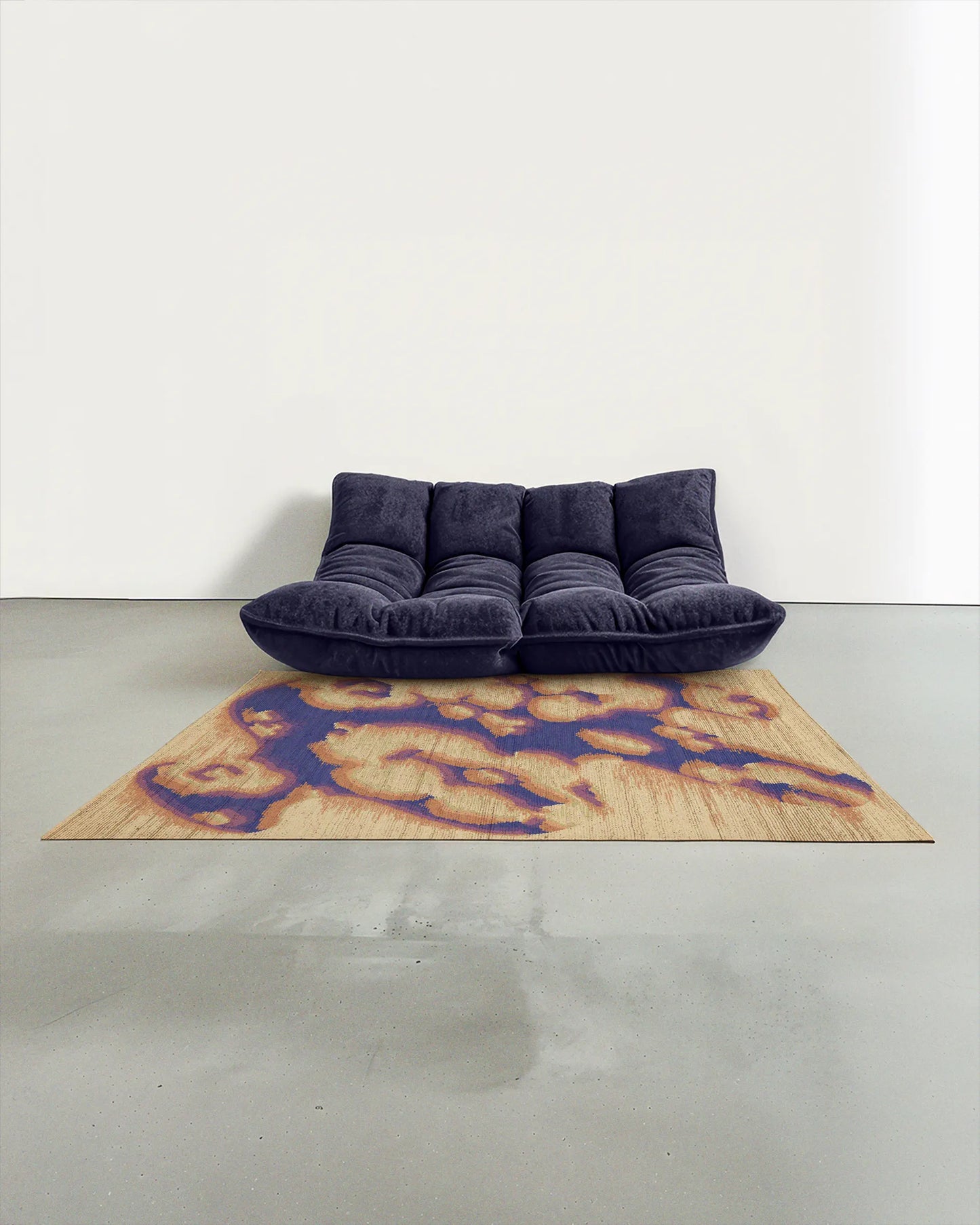 A dopamine abstract camouflage area rug measuring 5ft by 7ft, in purplish blue and creamy light yellow tones, placed in a contemporary modern studio with a dark purplish blue two-seat sofa.