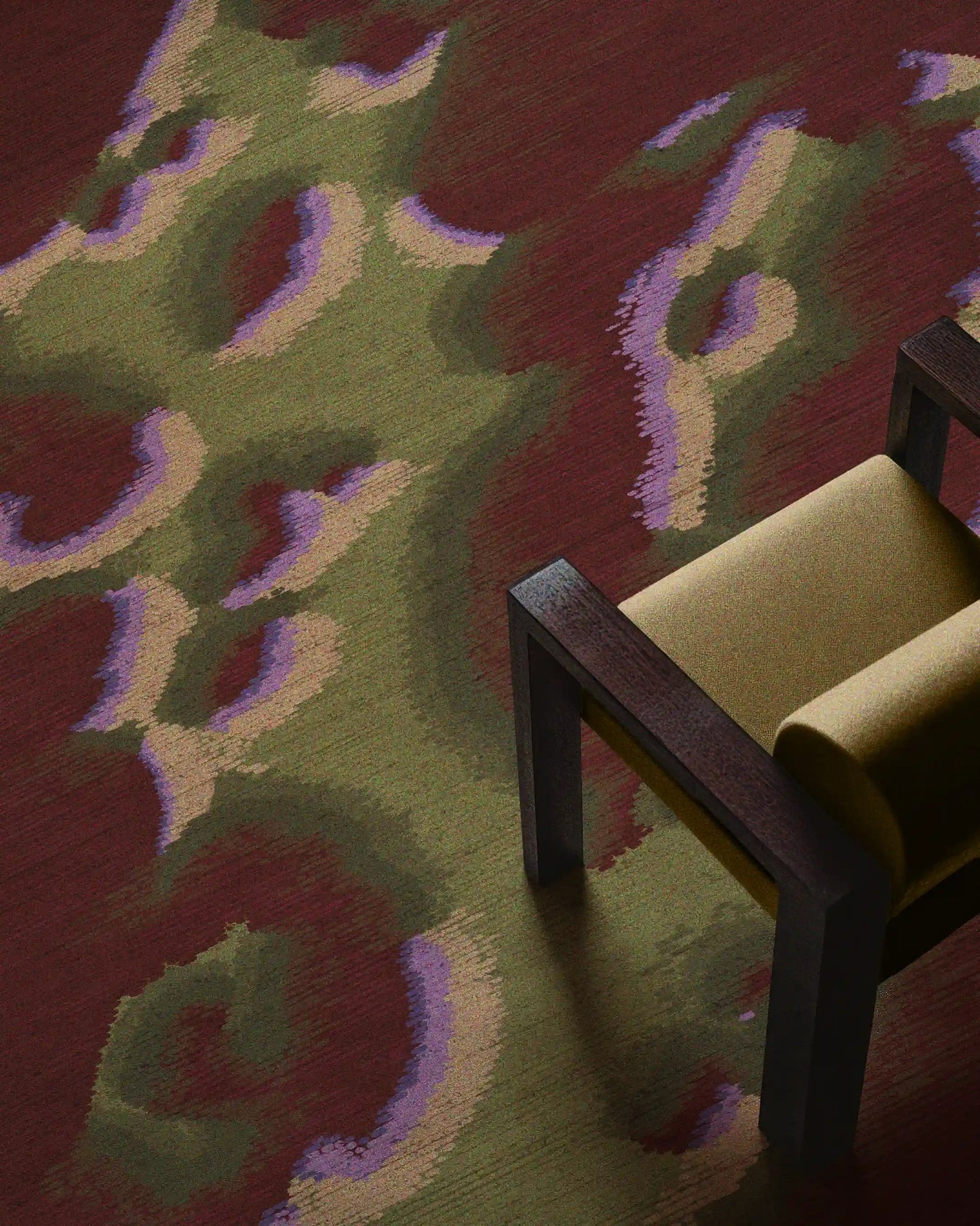 Fall colorful burgundy and olive green abstract camouflage area rug with slight touch of light yellow and pastel purple placed underneath a yellow wood armchair in the modern living room.