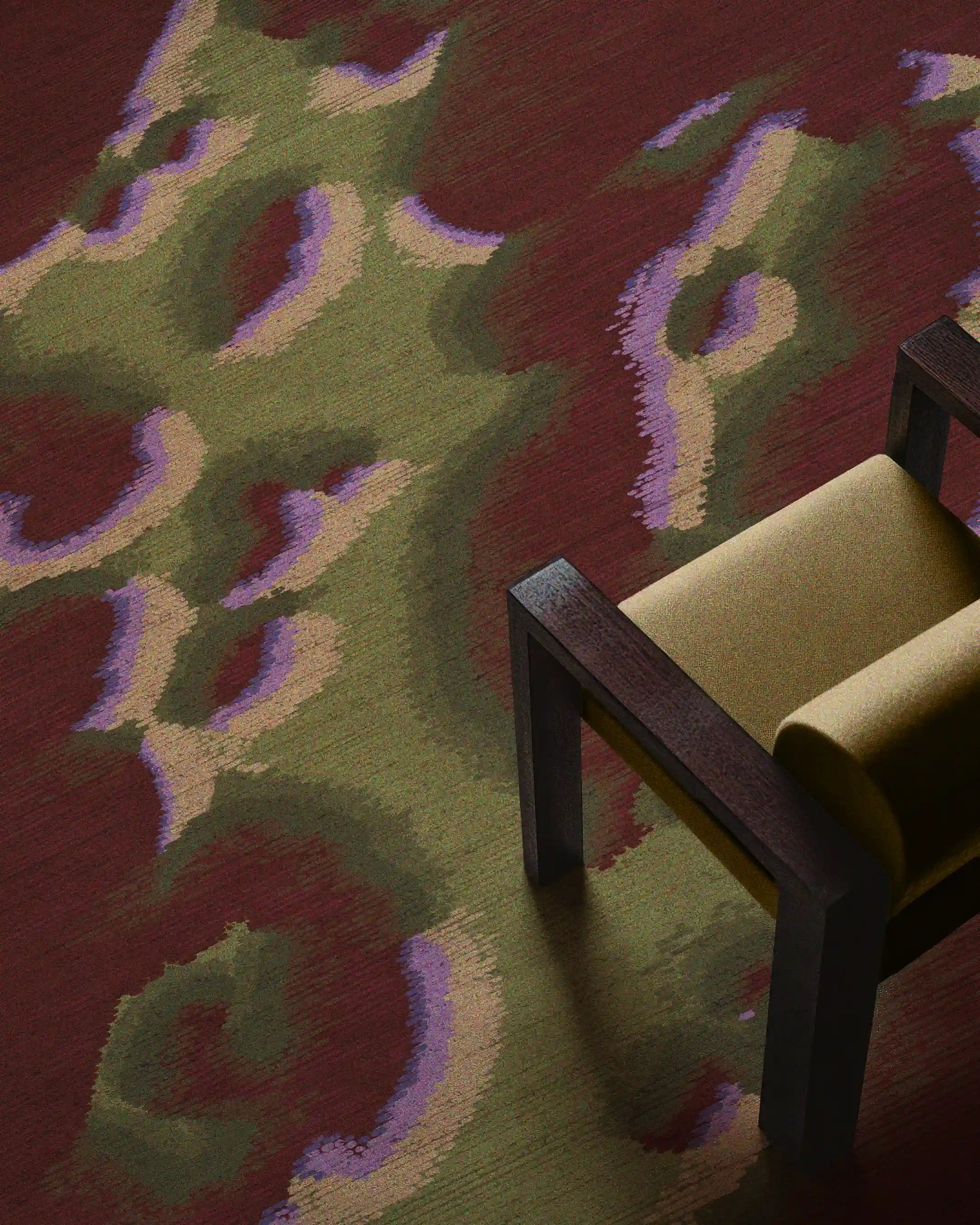 Fall colorful burgundy and olive green abstract camouflage area rug with slight touch of light yellow and pastel purple placed underneath a yellow wood armchair in the modern living room.