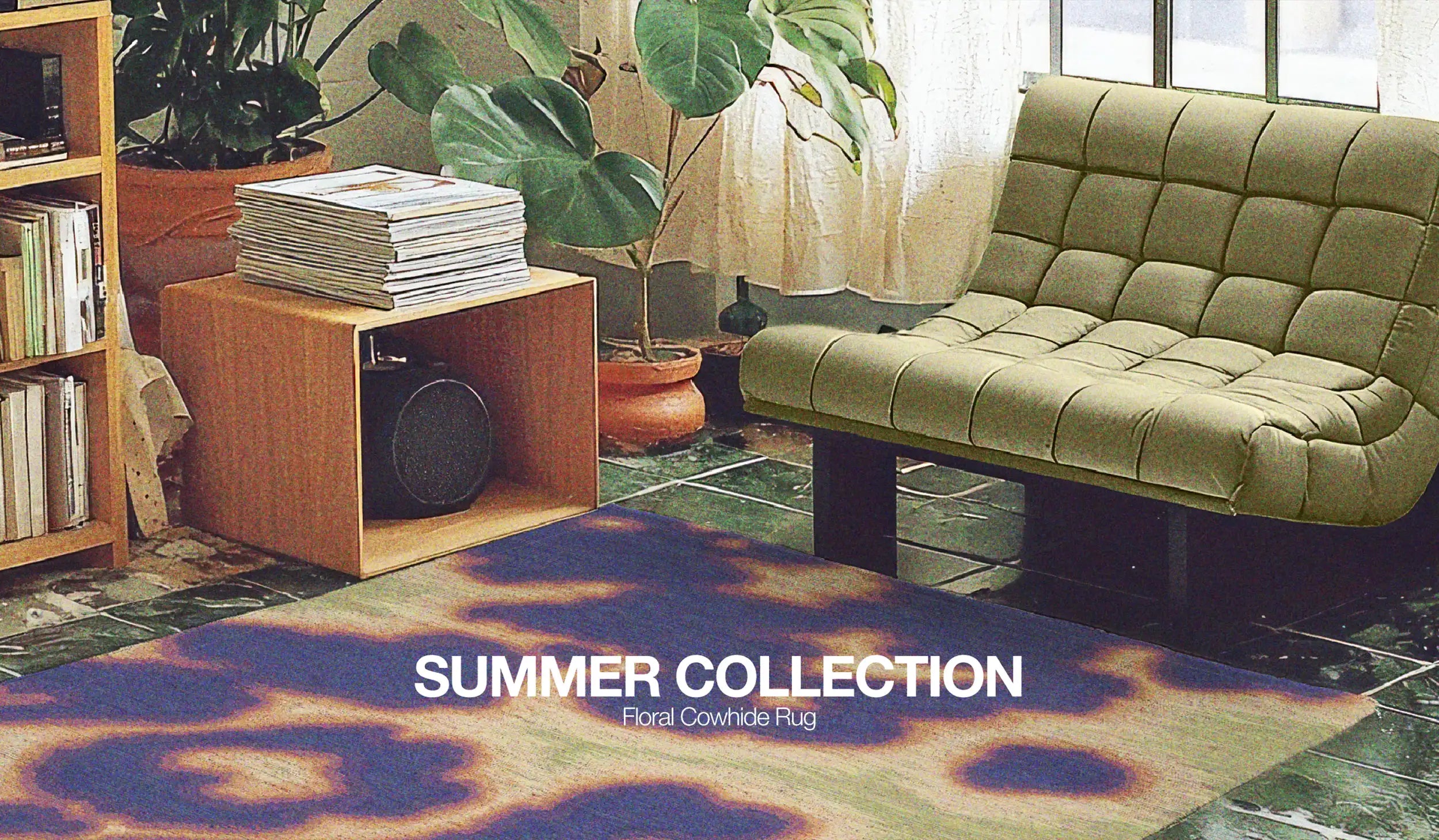 Desktop hero image for website of an eclectic purplish blue and light green area rug is showcased in the cozy modern apartment with wooden book shelves and a cabinet, green tiled floor, a light green single-seat sofa, and a large house plant in the eclectic dopamine living room.