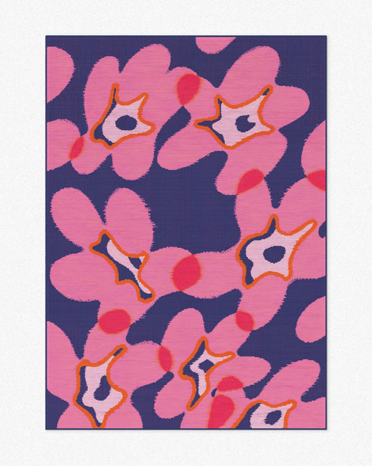 Area rug 5x7 ft, with cute abstract floral patterns in hot pink and dark blue hues set against a neutral beige background, highlighting its eclectic aesthetic.