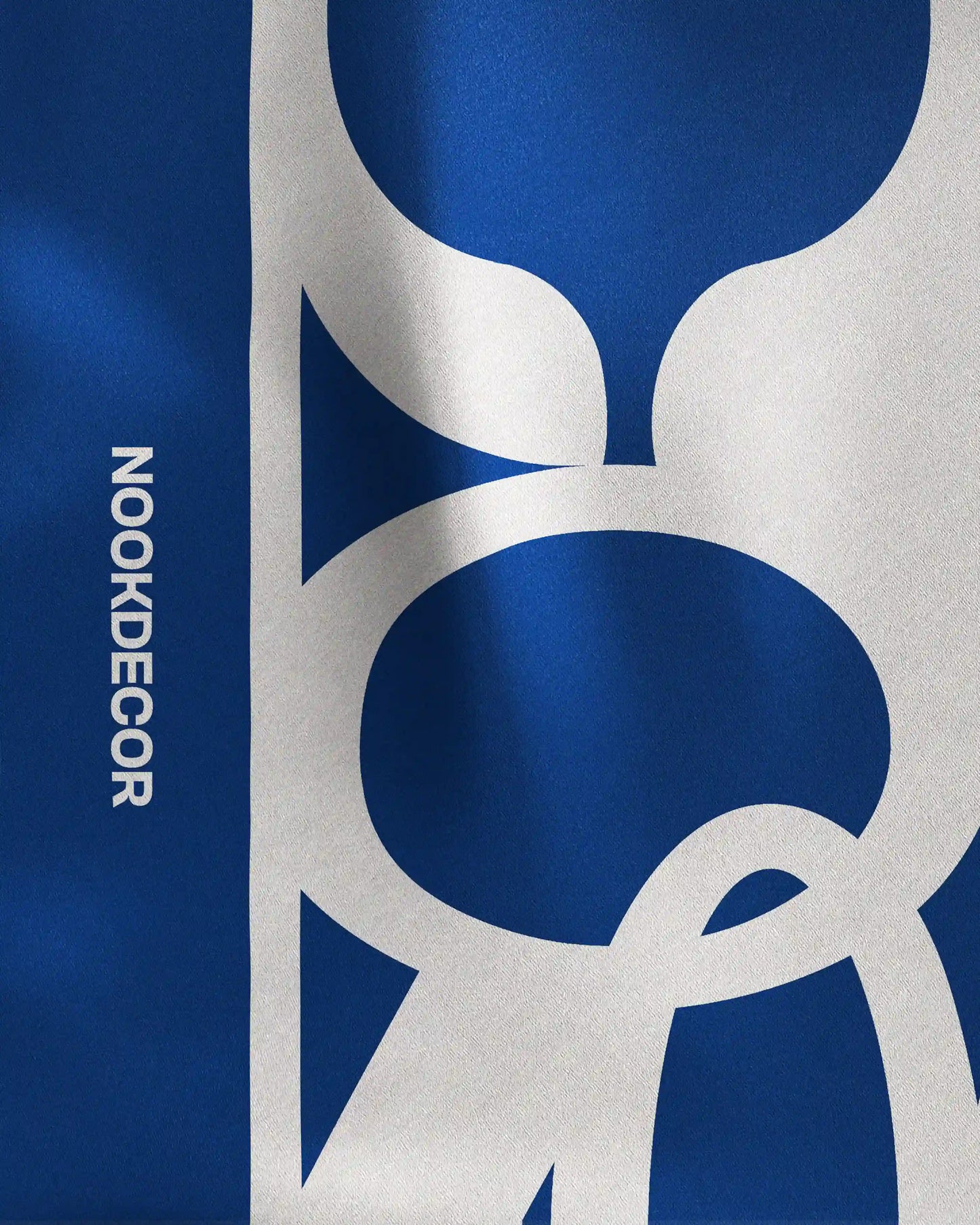 Detail of the mulberry silk bandana, with geometrical pattern of NOOKDECOR’s logo, highlighting its quality, Multifunctional chic handkerchief can also be colorful chic twilly and statement colorful accessory.