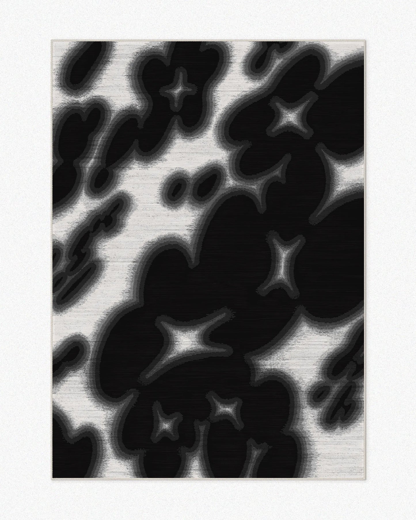 Abstract floral cowhide area rug, 5x7 ft, with bold black and off white hues, set against a light beige background. A playful and dopamine home decor for a fun and eclectic living room aesthetic.