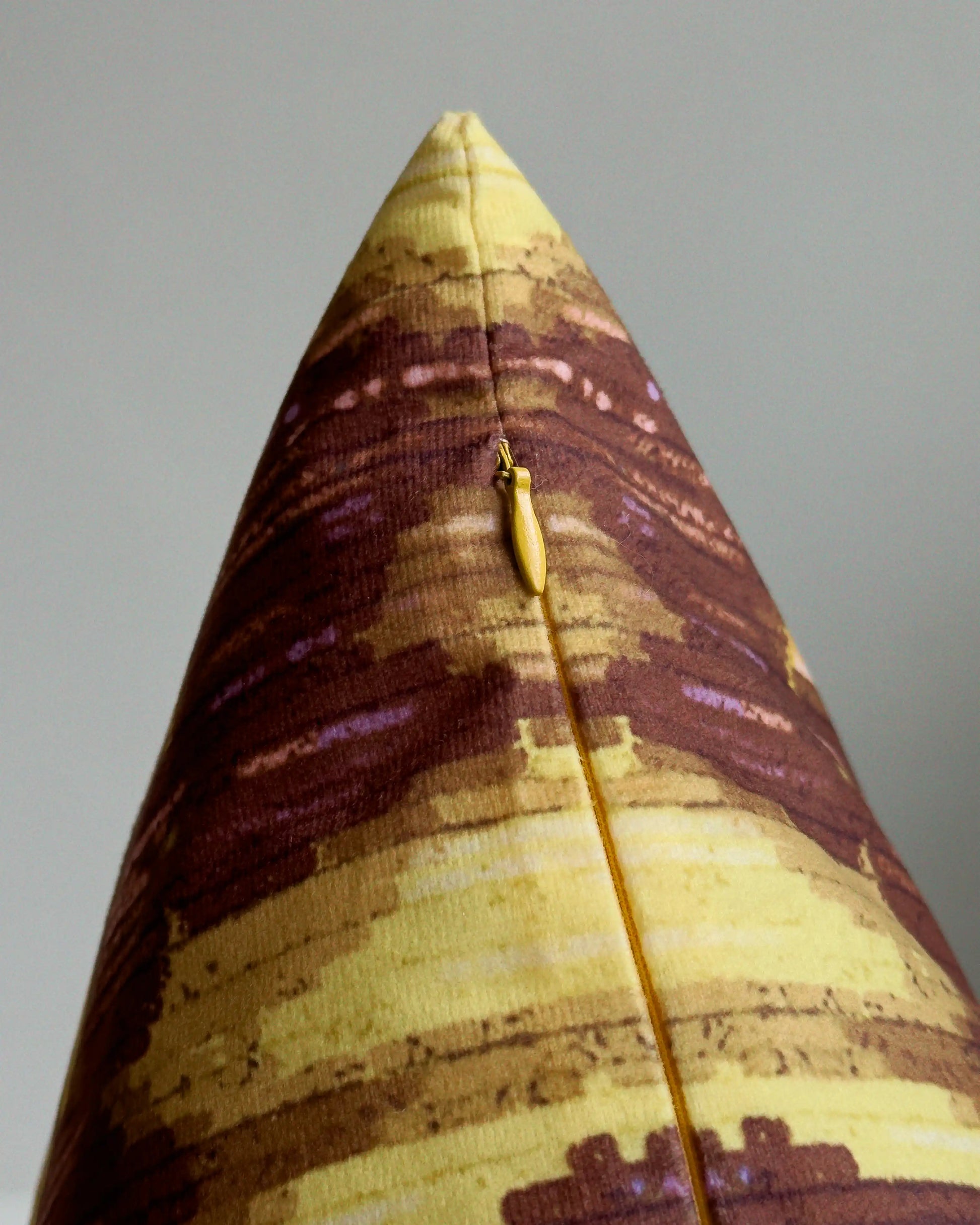 Close-up of hidden zipper closure in yellow white on yellow and brown abstract floral leopard cushion cover, showing easy insertion and premium construction details.