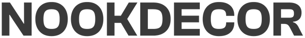 Website material for the Nook Decor brand - the logo "NOOKDECOR" in all capital letters, displayed in deep grey on a transparent background.