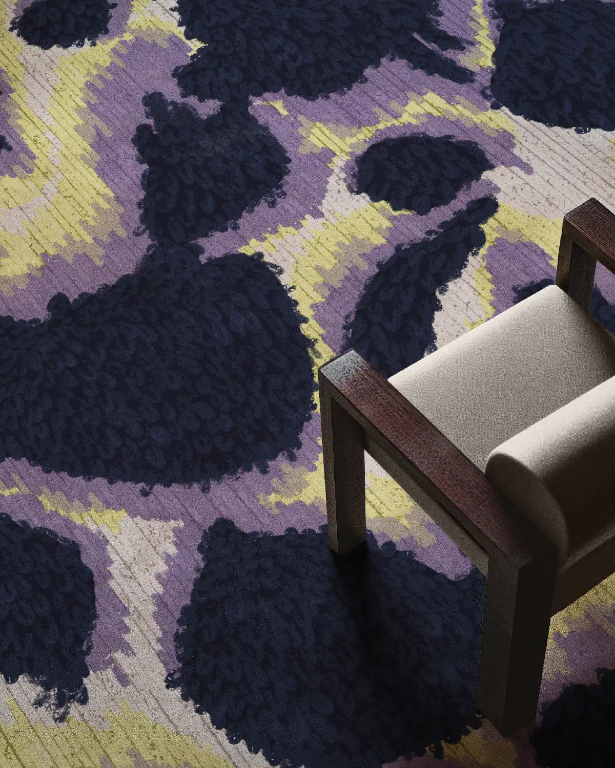 Animal print cowhide rug 8x10 features purple and yellow hues underneath a cream beige chair, an eclectic home decor for a modern living room.