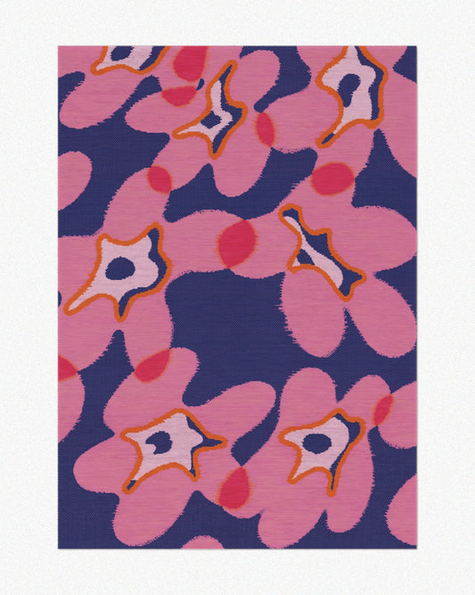 Area rug 5x7 with cute abstract floral patterns in hot pink and dark blue hues set against a neutral beige background, highlighting its eclectic aesthetic.